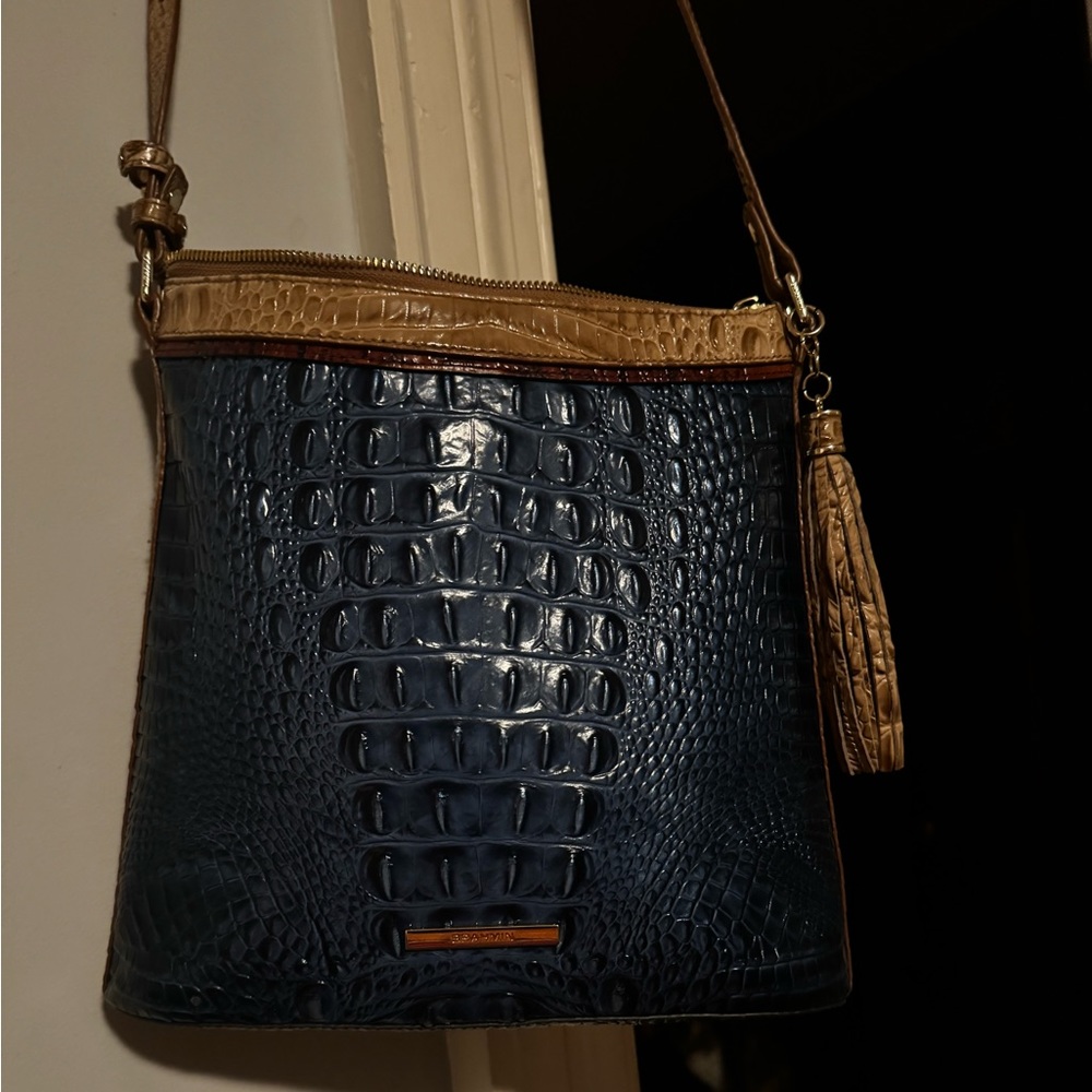 Used Brahmin crossbody. Light wear and stains but plenty of life left.